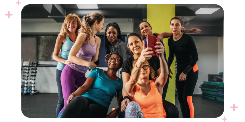 A group of gym-goers taking a selfie after a fun session