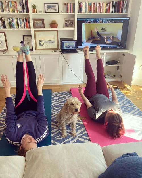 Two Pilates clients enjoying online classes through Plates studio software