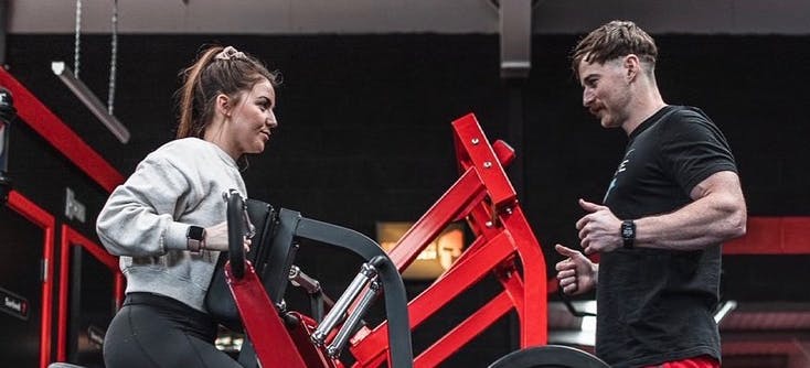 a trainer and client at the spartan chamber gym