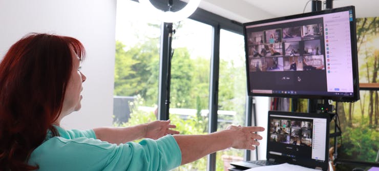 karen grinter instructing a pilates class online using Zoom