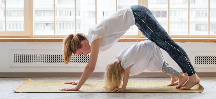 a mom and her child working out