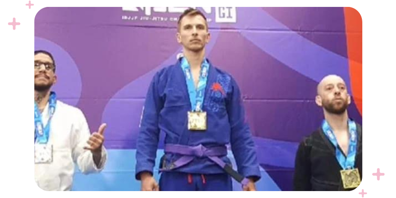 Tom winning first place in a Brazilian Jiu-Jitsu competition 