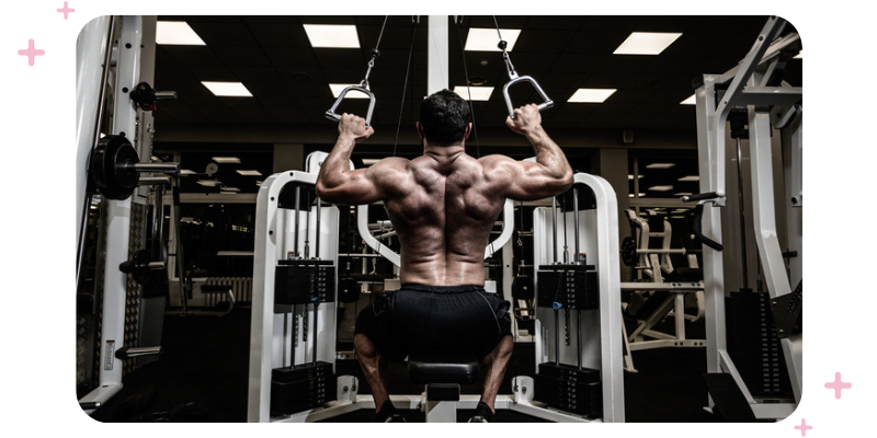 Bodybuilder working out at the gym.