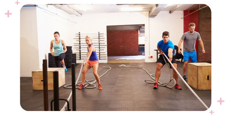 People doing circuit training at the gym.