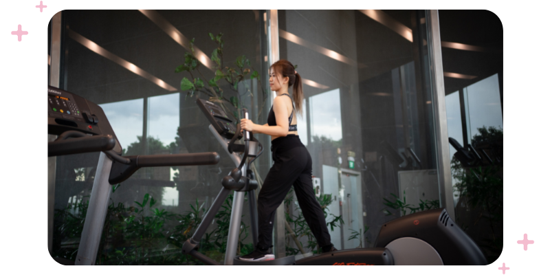 Girl on a treadmill at the gym.