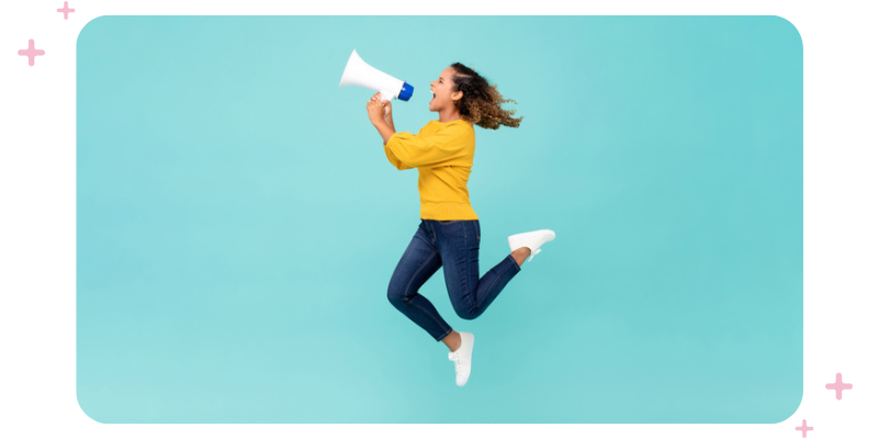 Girl with megaphone jumping.