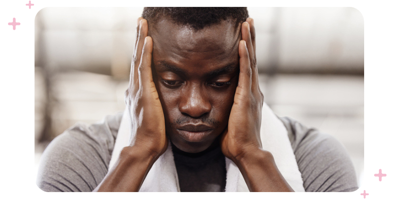 Man stressed out at the gym.