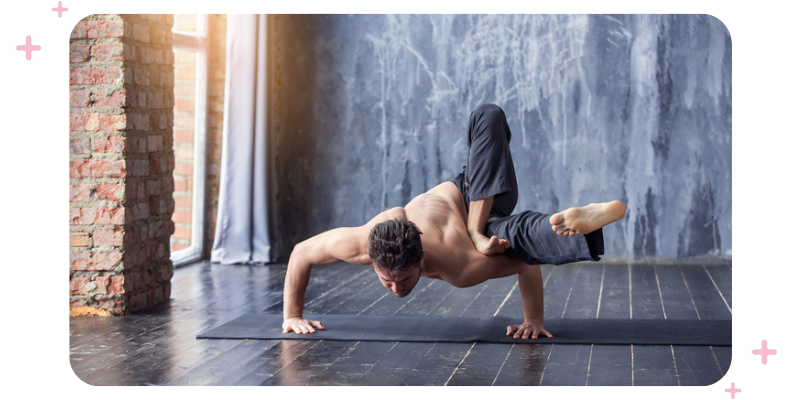 A man in a yoga pose .